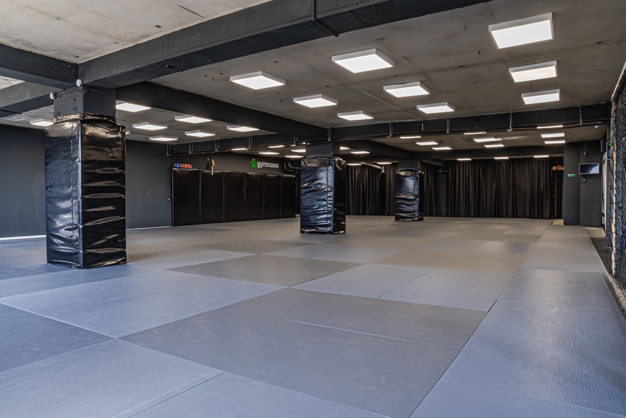 Large Brazilian Jiu-Jitsu mat space inside the BJJ camp facility